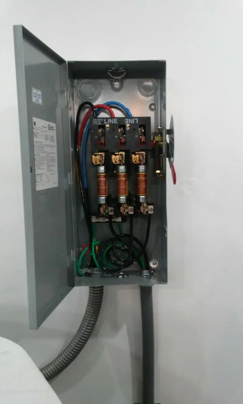 Three-phase disconnect switch installed for Smoke Detector Installation in Emerald Mountain